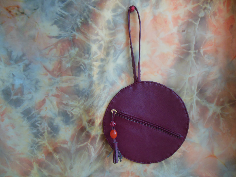 circle leather clutch